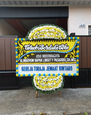 Papan Bunga Duka di Luau Jawuk
